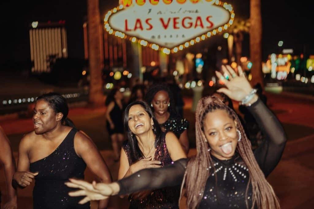 Nightclub on Wheels Party Bus at Las Vegas Sign