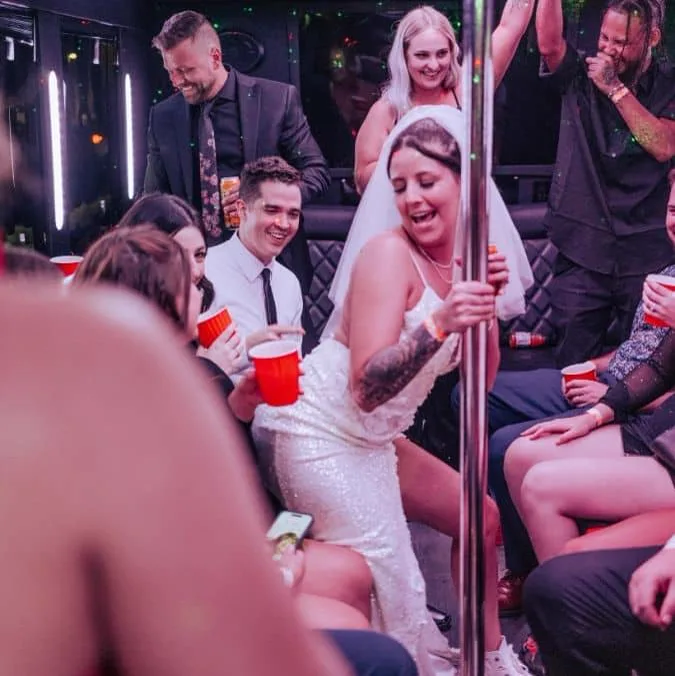 Bride dancing on party bus Las Vegas wedding