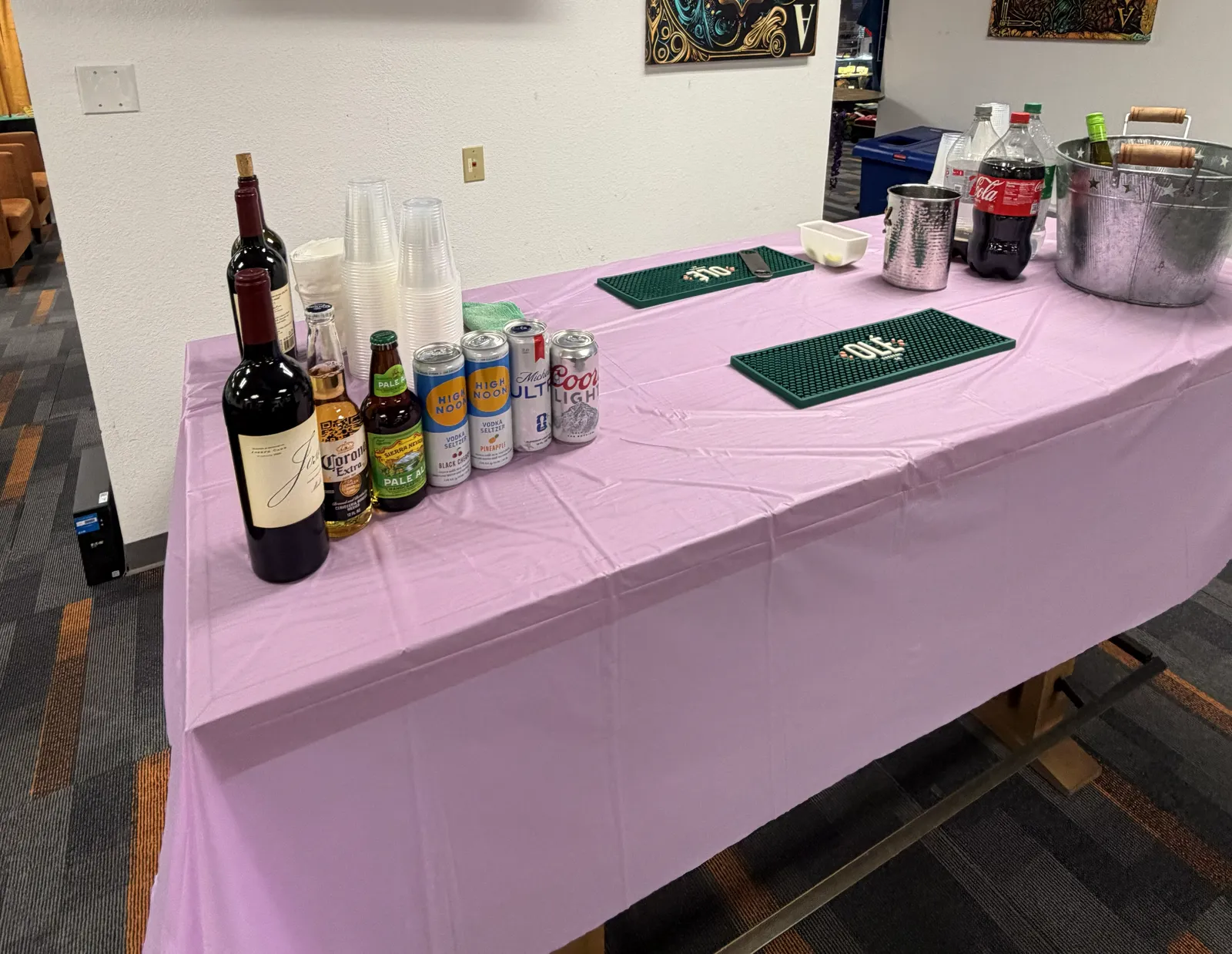 Guests' own beer, wine, and seltzers set up on a table at the Las Vegas casino lesson venue