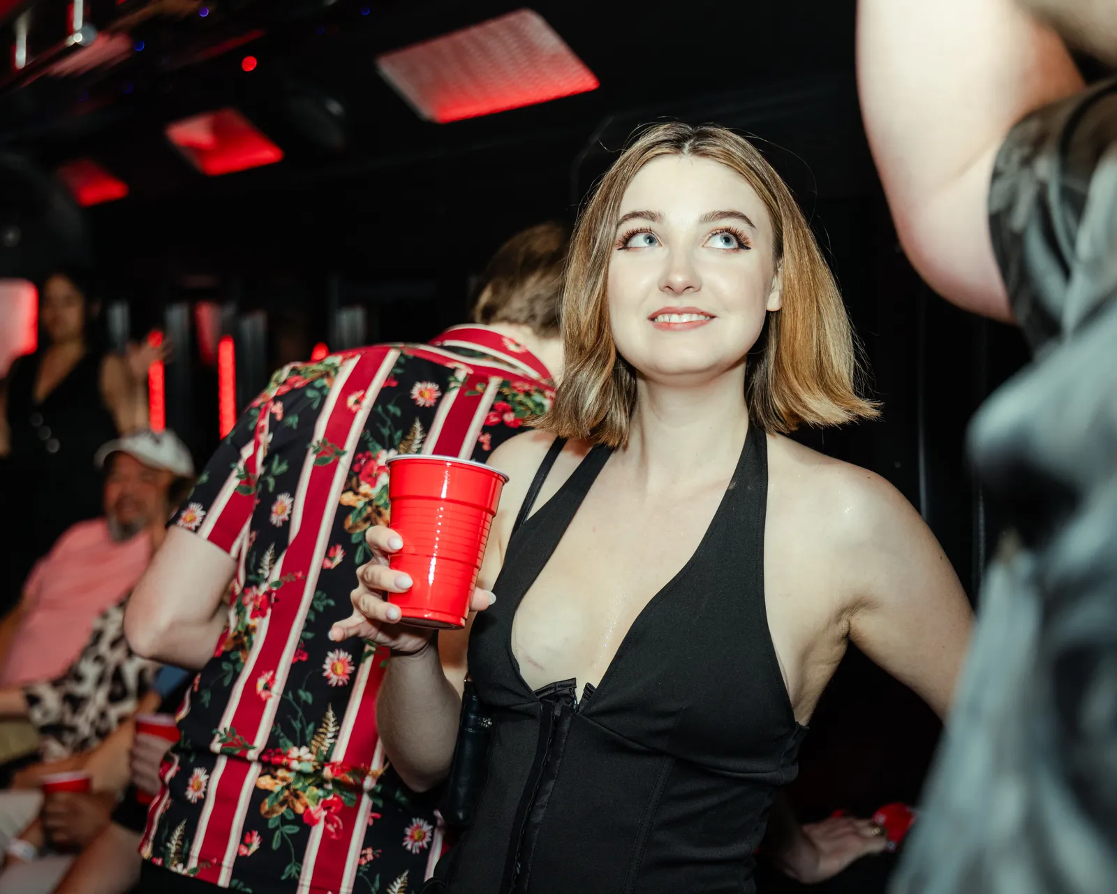 GXP Tours guests celebrating on the Nightclub on Wheels party bus in Las Vegas