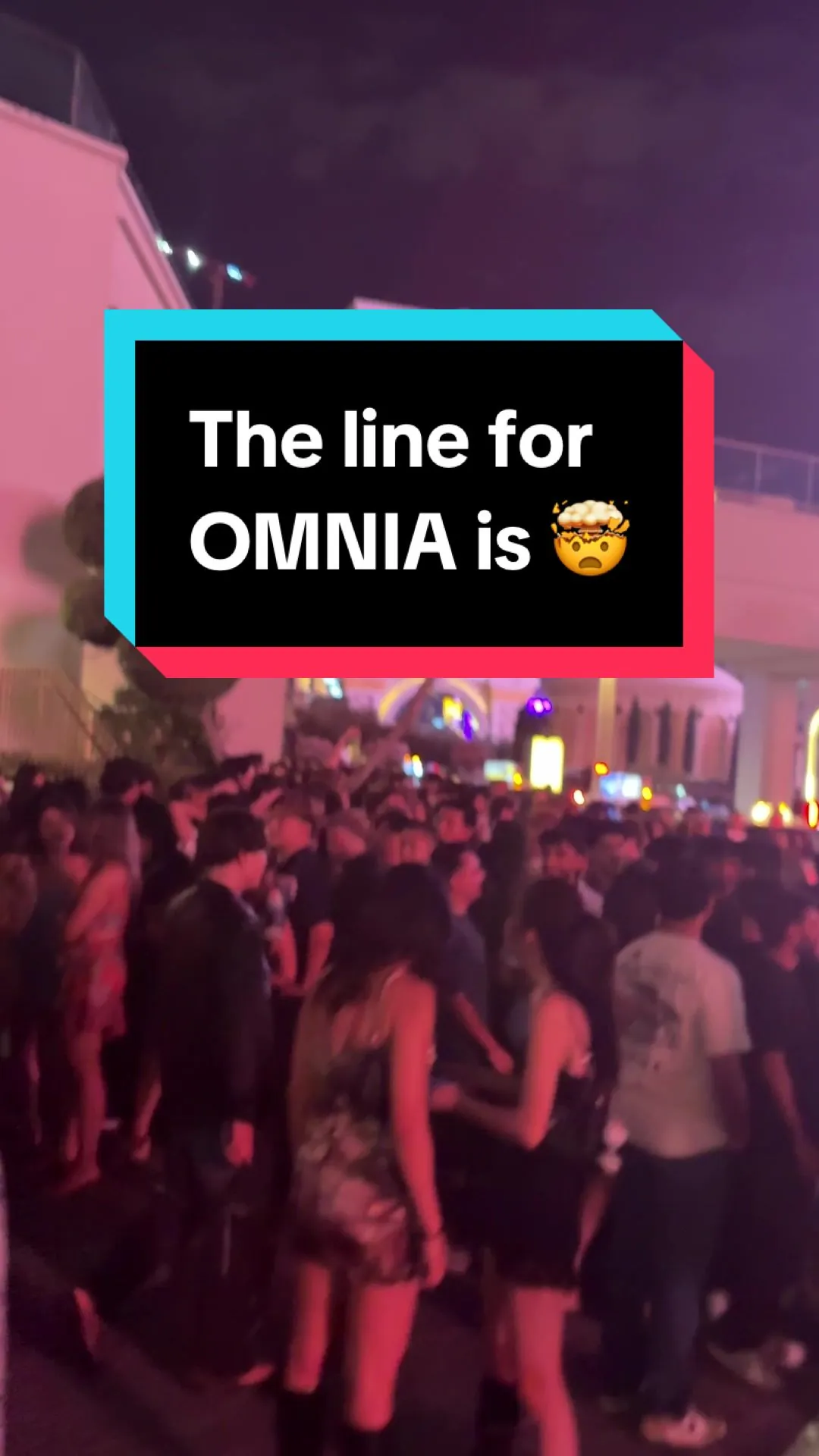 A packed crowd lined up outside Omnia nightclub at Caesars Palace on a peak Las Vegas weekend